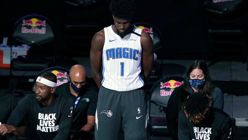 Jonathan Isaac standing during the national anthem.
