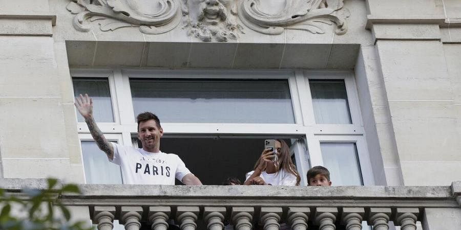 A Magical Moment: Lionel Messi gestures thumbs up to an Indian fan in Paris