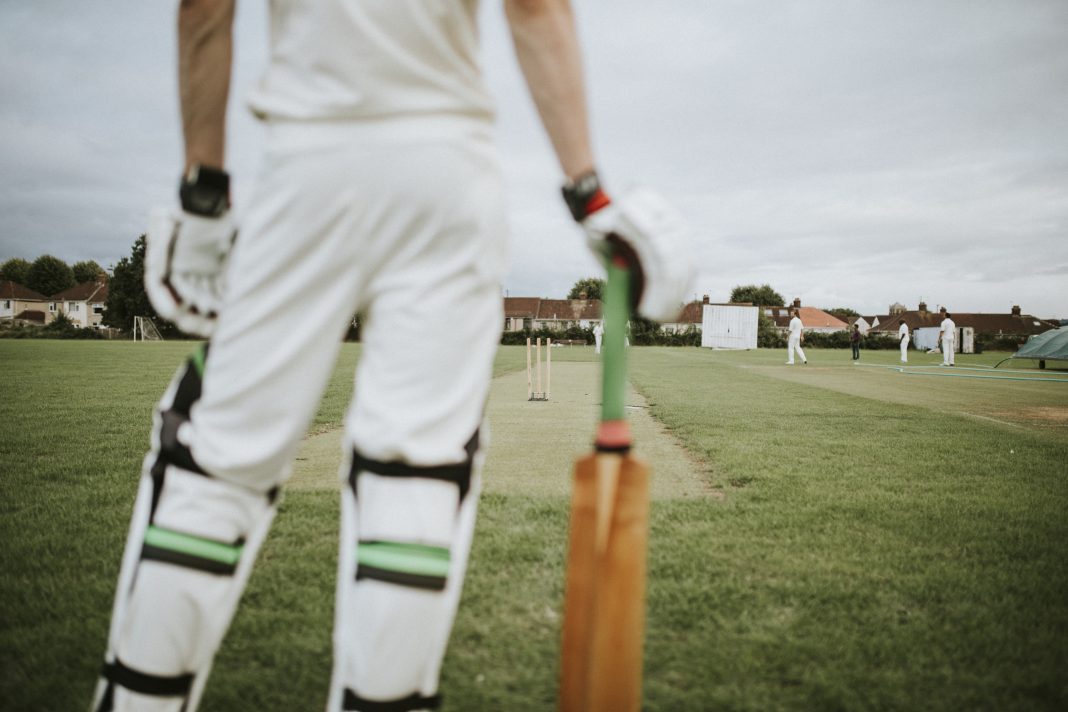 cricket-player-standing-field